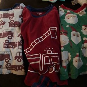3 sets Carter’s 2T pajamas: fire trucks and Santa